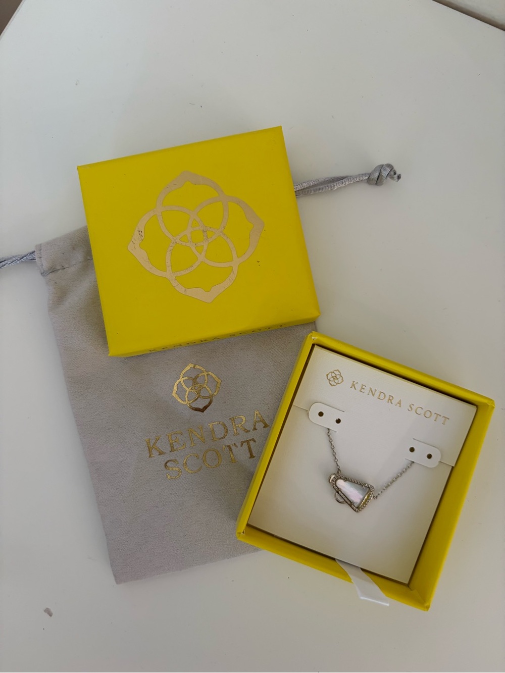 Kendra Scott Silver Necklace with Pale Pink Teardrop Pendant
